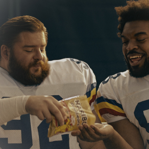 Players sharing sweets before a game